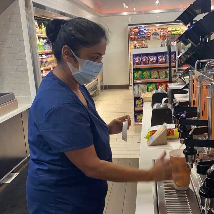 woman getting coffee
